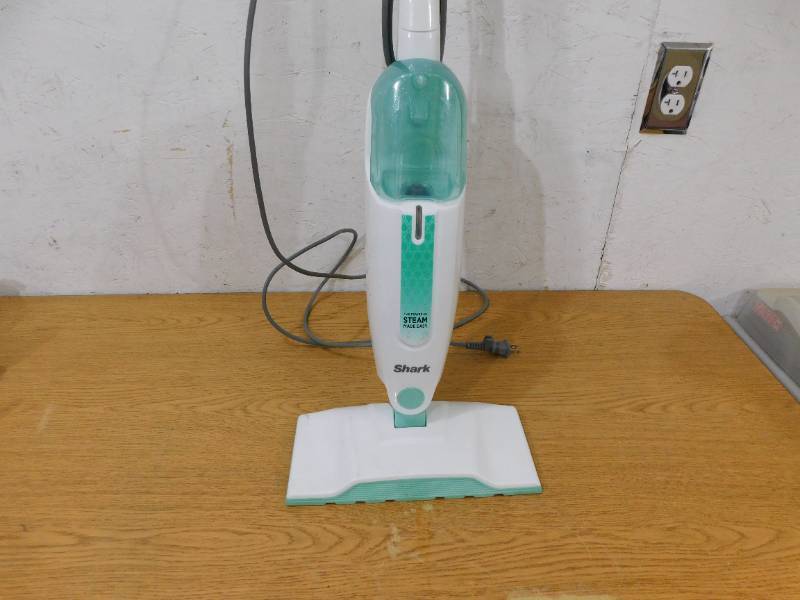 lot 25 image: Shark Corded Steam Mop for Hard Floor Surfaces, Tile, Stone, Laminate in Blue with XL Removable Water Tank