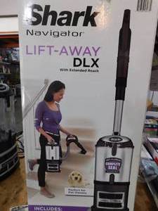 lot 41 image: Shark Navigator Lift-Away DLX Bagless Corded HEPA filter Upright Vacuum for Multi-Surface and Pet Hair in Black