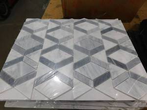 lot 112 image: (2) Daltile Xpress Mosaix Peel N Stick Moonstone 18 in. x 14 Marble Hinge Mosaic Tile (32 sq. ft.)