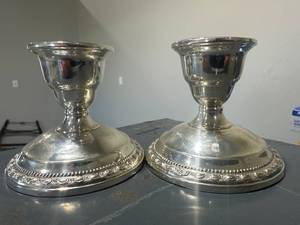 lot 10 image: Pair of La Pierre Sterling Silver Weighted Candle Stick Holders
