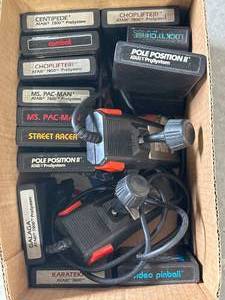 lot 31 image: Vintage Atari Games & Controller Lot