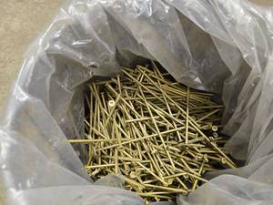 lot 45 image: A bucket of 6 star drive steel flat head exterior screws