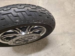 lot 9 image: Harley Davidson Dunlop D402F tire from a 2010 HD trike