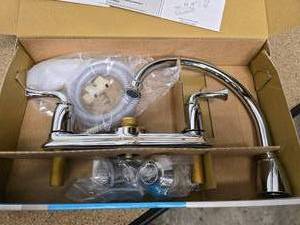 lot 13 image: Moen Banbury 2-Handle Kitchen faucet - new in box - chrome