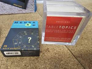 lot 19 image: 4 Games - chinese checkers, electric putting cup, Mensa - word puzzles, Tabletopics - questions to start great conversations
