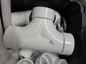 lot 25 image: Tote of new PVC pipes - various sizes  - mostly larger sizes (TOTE NOT INCLUDED)