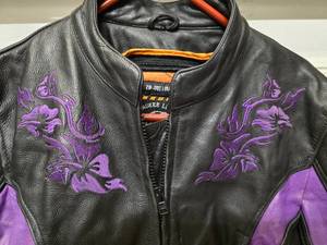 lot 27 image: Womens Milwaukee Leather jacket - Black and purple