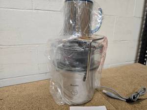 lot 28 image: Breville Juicer - silver color - compact - NIB