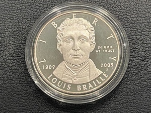 lot 60 image: 2009-P Louis Braille Silver Dollar