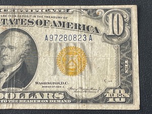 lot 65 image: 1934 A Yellow Seal $10 Dollar Silver Certificate