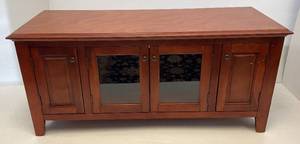 lot 159 image: Nice Wood And Glass Front TV Stand 57 L x 25 H x 20W