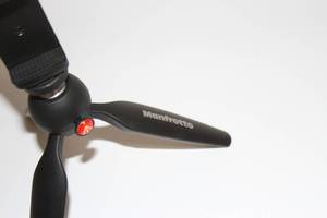 lot 118 image: Foldable A-Frame Guitar Stand and Manfrotto Portable Pro Video Mini Folding Phone  Camera Tripod