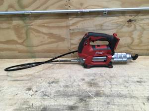 lot 40 image: Milwaukee M18 Cordless 2-Speed Grease Gun Model # 2646-20 (Tool Only)