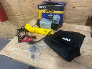 lot 54 image: Klutch 12 Volt Heavy-Duty Portable Tire Inflator, 120 Max. PSI, 2.1 CFM