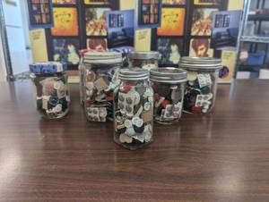 lot 24 image: 8 Glass Jars - Buttons, Keys, Shells, Game Pieces, and More