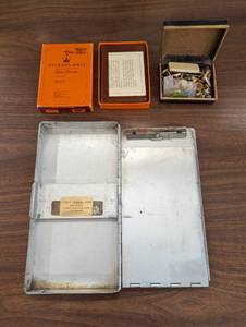 lot 34 image: Amazing 3 Piece Set - ReceiptInvoice Case - Zondervan Bible - Cufflinks, Rings, More