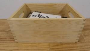 lot 53 image: Small Wooden Tote with 11 Wooden Wall Shelf Decor