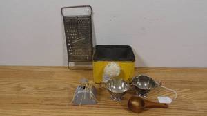 lot 65 image: Vintage Tea Canister with Grater, Pewter Sugar & Creamer Bowls, Wooden Scooper, and Farmhouse Bell