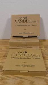 lot 104 image: Lot of 48 2 Floating Candles Disc-36 Black- 12 White