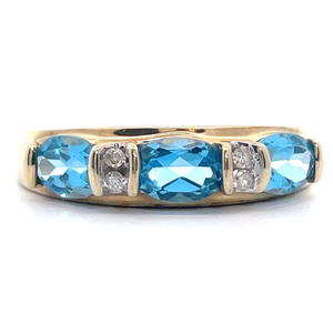 lot 37 image: Modern Blue Topaz & Channel Diamond Stacking Ring in Yellow Gold