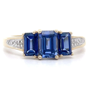 lot 40 image: Three-Stone Emerald Cut Lab-Created Sapphire & Diamond Ring in Yellow Gold