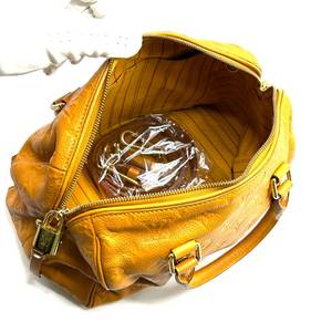 lot 5N image: Louis Vuitton Yellow Leather Monogram Empreinte Speedy Bandouliere 25 w Shoulder Strap - Authentic $2,000 Retail