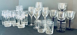 lot 36 image: Gorgeous Clear Glass Including Wine Glasses, Wine Glasses with Cobalt Stems, Crisa Cocktail Glasses and Crisa Drinking Glasses with Flowers