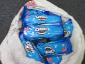 lot 334 image: 12- 2.4 oz Oreos...