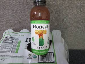 lot 369 image: 12- 16.9 oz Honest Organic Honey Gr...