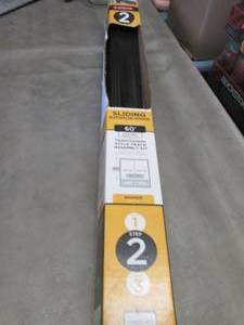 lot 3 image: Delta Sliding Bath Tub Door 60 inch...
