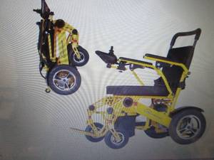 lot 33 image: Widen 20 Folding 500W Electric Whe...