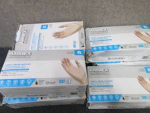 lot 142 image: 7 - 100 ct Ammex XL Vinyl Gloves...