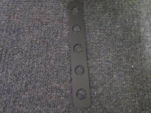 lot 179 image: Case of 5 Hole Black Nonmetal Items...