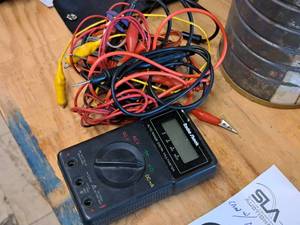 lot 66 image: Radio Shack Auto Range Digital Multimeter with Extra Cables