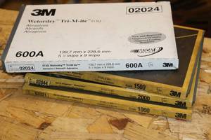 lot 210 image: Lot of (4 Boxes) Assorted Sandpaper Sheets - 401Q Imperial Wetordry 020230204402021, 3M Wetordry Tri-M-ite 413Q 600A