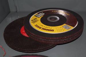 lot 243 image: Lot of (7) Assorted Grinding Discs - (2) 7 for Metal, (2) 7 for Masonry, (3) 7x14 for Masonry