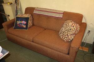 lot 1002 image: Living Room Hide-A-Bed Sofa with Throw Pillows
