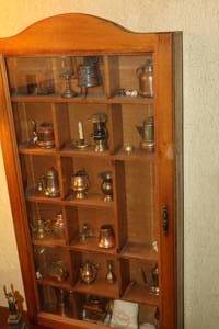 lot 1005 image: Vintage Wood Frame  Glass Display Case with Vintage Camping Dcor