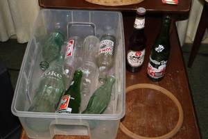 lot 1044 image: Lot of (9) Vintage Glass Soda Pop Bottles - Mountain Dew, Schells, , Coke, 7up