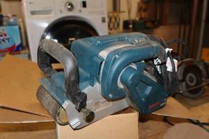 lot 282 image: Bosch 1200W Electric Belt Sander 1276D