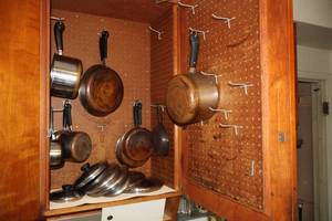 lot 1107 image: Contents of Cupboard - Pots and Pans, Lids