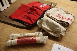 lot 373 image: (9) Tool Pouches, (1) Bucket Boss, (2) Clotheslines