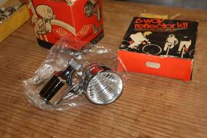lot 378 image: Vintage Miller Combilite Bicycle Light and 6-Way Reflector Kit (New)