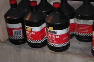 lot 438 image: Lot of (7) Warren Premium Motor Oil SAE 30 1-Quart Plastic Bottles