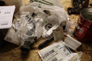 lot 550 image: Lot of (1 Bag) Assorted Plumbing Supplies and Accessories