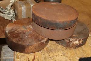 lot 702 image: Metal Round Stock - (3) 9Dx2-12, (1) 9Dx1-34