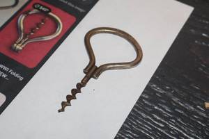 lot 1141 image: Vintage Pre WWI Folding Bow Corkscrew