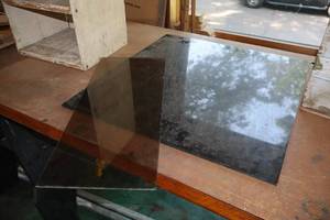 lot 987 image: (1) Piece of Glass 22x9x316, (1) Acrylic Panel 23-34x22x14