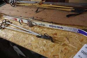 lot 989 image: Vintage Sno Star Snow Skis with 38 Poles 56x2x34x1