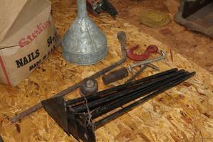 lot 1185 image: Assorted Garage Items - 1-78 Ball Hitch, Metal Funnel, Crow Bar, Hook, Wall Hooks, Angle Screwdrivers